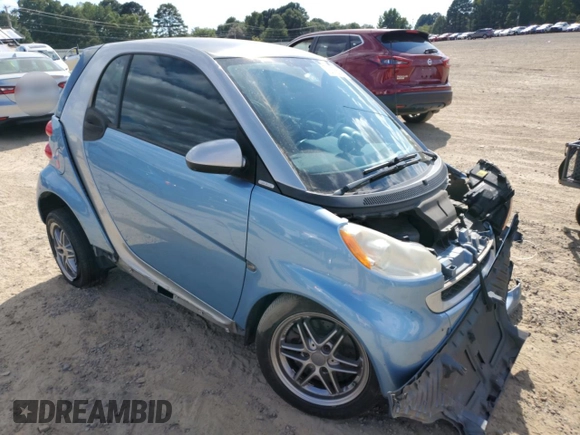 2011 Smart fortwo Pure with VIN WMEEJ3BA8BK429292, listed as a Copart auction lot 72915554 with 126,673 mi miles and Salvage title. Bid and sale history available at DreamBid. Image 4.
