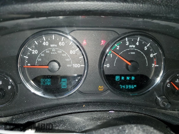 2018 Jeep Wrangler JK Unlimited Sport S with VIN 1C4BJWDG2JL837817, listed as a Copart auction lot 71153094 with 74,396 mi miles and Salvage Title. Bid and sale history available at carsss.com. Image 9.