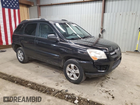 2009 Kia Sportage LX with VIN KNDJF724597564338, listed as a Copart auction lot 44123195 with 113,132 mi miles and Salvage Title. Bid and sale history available at carsss.com. Image 4.