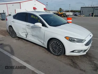 2018 Ford Fusion Titanium with VIN 3FA6P0D98JR124040, listed as a IAAI auction lot 41123958 with 173,292 mi miles and . Bid and sale history available at DreamBid. Image 1.