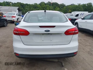2018 Ford Focus SE z VIN 1FADP3F24JL247003, wystawiony jako IAAI lot #42531969 z przebiegiem 55 344 mil mil oraz . Historia ofert i sprzedaży dostępna na DreamBid. Obrazek 16.