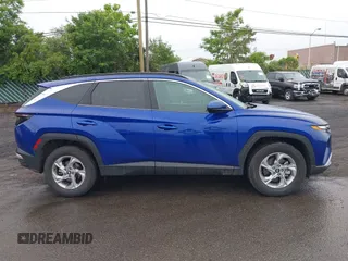 2022 Hyundai Tucson SEL z VIN 5NMJBCAE1NH026298, wystawiony jako IAAI lot #42365533 z przebiegiem 44 080 mil mil oraz . Historia ofert i sprzedaży dostępna na DreamBid. Obrazek 13.