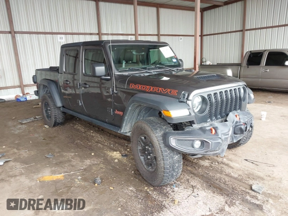 2022 Jeep Gladiator Mojave z VIN 1C6JJTEG8NL182360, wystawiony jako IAAI lot #42194516 z przebiegiem 67 658 mil mil oraz . Historia ofert i sprzedaży dostępna na DreamBid. Obrazek 1.
