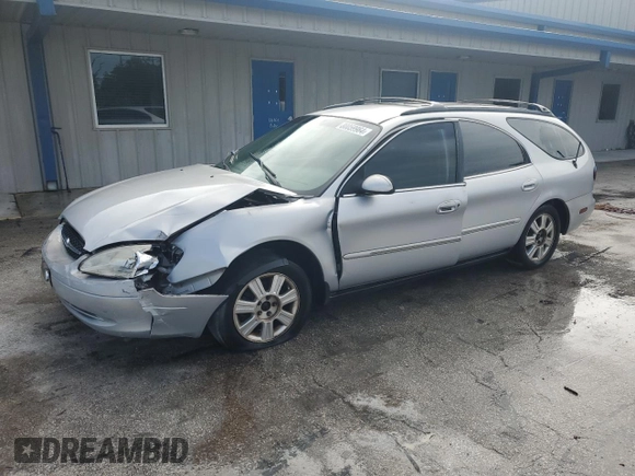 2003 Ford Taurus z VIN 1FAHP59U73A217826, wystawiony jako Copart lot #80059964 z przebiegiem 315 560 mil mil oraz Szkody całkowita. Historia ofert i sprzedaży dostępna na DreamBid. Obrazek 1.