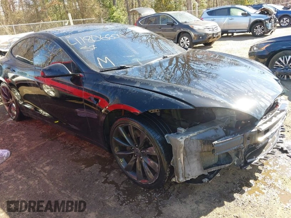 2014 Tesla Model S 60 with VIN 5YJSA1H1XEFP34226, listed as a IAAI auction lot 41806604 with 216,021 mi miles and . Bid and sale history available at DreamBid. Image 1.