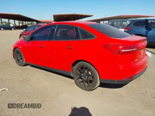 2016 Ford Focus SE with VIN 1FADP3F2XGL256037, listed as a IAAI auction lot 42047789 with 130,274 mi miles. Bid and sale history available at carsss.com. Image 3.