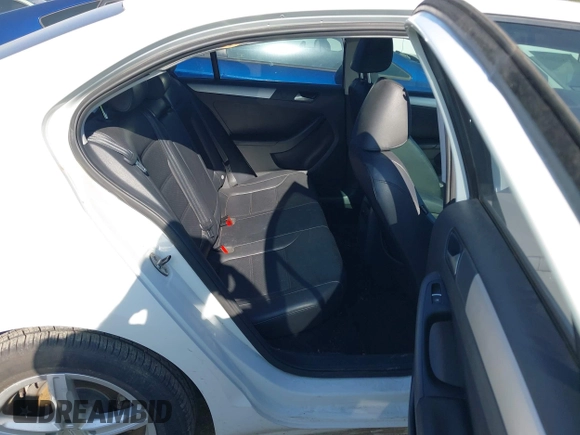 2014 Volkswagen Jetta SE z VIN 3VWD07AJ1EM281910, wystawiony jako IAAI lot #42823665 z przebiegiem 86 182 mil mil oraz . Historia ofert i sprzedaży dostępna na DreamBid. Obrazek 8.