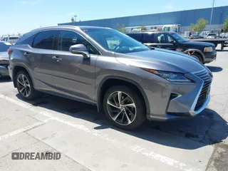 2019 Lexus RX 350 z VIN 2T2ZZMCA4KC142476, wystawiony jako IAAI lot #42228689 z przebiegiem 71 362 mil mil oraz . Historia ofert i sprzedaży dostępna na DreamBid. Obrazek 1.