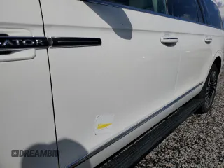 2020 Lincoln Navigator Black Label z VIN 5LMJJ3TT4LEL21595, wystawiony jako Copart lot #73951494 z przebiegiem Nie podano mil oraz Szkoda całkowita • Salvage title. Historia ofert i sprzedaży dostępna na DreamBid. Obrazek 13.