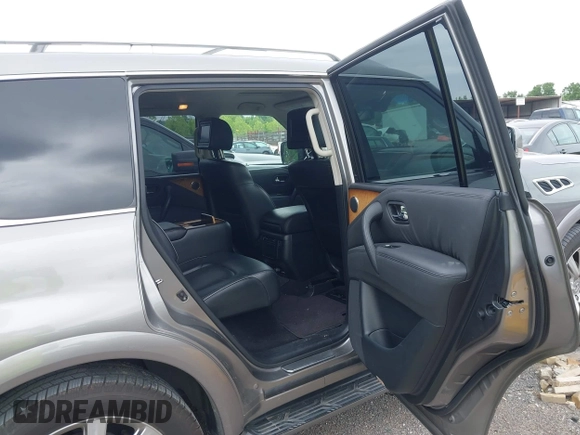 2012 Infiniti QX56 7-passenger z VIN JN8AZ2NEXC9020903, wystawiony jako IAAI lot #42295424 z przebiegiem 181 714 mil mil oraz . Historia ofert i sprzedaży dostępna na DreamBid. Obrazek 8.