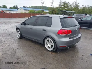 2012 Volkswagen Golf TDI z VIN WVWNM7AJ9CW253796, wystawiony jako IAAI lot #42349448 z przebiegiem 139 688 mil mil oraz . Historia ofert i sprzedaży dostępna na DreamBid. Obrazek 3.