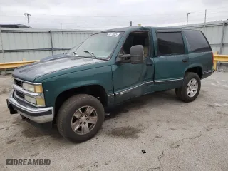 1997 Chevrolet Tahoe with VIN 1GNEK13R5VJ420751, listed as a Copart auction lot 44770025 with 236,378 mi miles and Salvage Title. Bid and sale history available at carsss.com. Image 1.