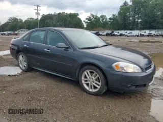 2013 Chevrolet Impala LTZ with VIN 2G1WC5E38D1110931, listed as a Copart auction lot 54889965 with 219,336 mi miles and Clean Title. Bid and sale history available at DreamBid. Image 4.
