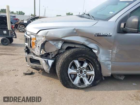 2020 Ford F-150 XL with VIN 1FTEW1E54LKE24160, listed as a IAAI auction lot 42316733 with 83,215 mi miles and . Bid and sale history available at DreamBid. Image 6.