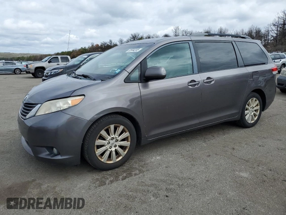2012 Toyota Sienna XLE with VIN 5TDDK3DC2CS038316, listed as a Copart auction lot 52694245 with 273,415 mi miles and Clean Title. Bid and sale history available at DreamBid. Image 1.