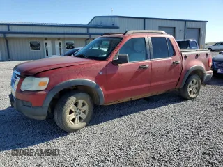 2007 Ford Explorer Sport Trac XLT z VIN 1FMEU51887UA09474, wystawiony jako Copart lot #57625115 z przebiegiem 128 443 mil mil oraz Szkoda całkowita • Salvage title. Historia ofert i sprzedaży dostępna na DreamBid. Obrazek 1.