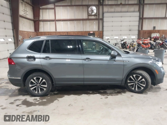 2022 Volkswagen Tiguan S z VIN 3VV0B7AX2NM042934, wystawiony jako IAAI lot #42172199 z przebiegiem 71 367 mil mil oraz . Historia ofert i sprzedaży dostępna na DreamBid. Obrazek 13.