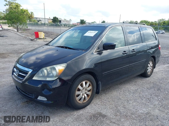 2007 Honda Odyssey Touring z VIN 5FNRL38827B059573, wystawiony jako IAAI lot #42261125 z przebiegiem 214 954 mil mil oraz . Historia ofert i sprzedaży dostępna na DreamBid. Obrazek 2.