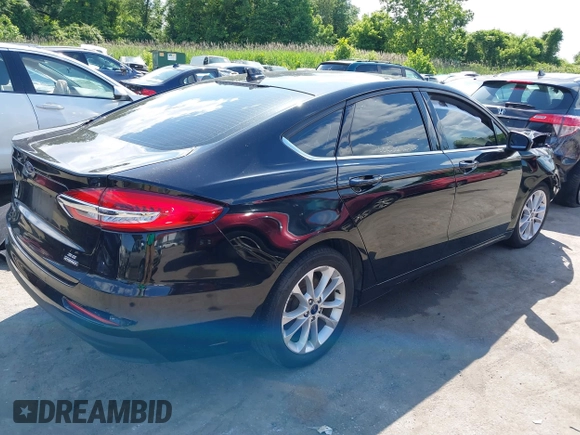 2020 Ford Fusion Hybrid SE with VIN 3FA6P0LU9LR161722, listed as a IAAI auction lot 42187436 with 49,376 mi miles. Bid and sale history available at carsss.com. Image 4.