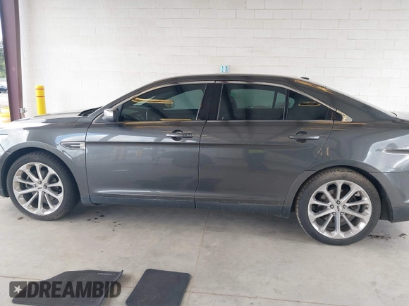 2016 Ford Taurus Limited z VIN 1FAHP2F84GG141829, wystawiony jako IAAI lot #42179934 z przebiegiem 144 191 mil mil oraz . Historia ofert i sprzedaży dostępna na DreamBid. Obrazek 15.
