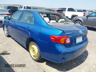 2009 Toyota Corolla with VIN JTDBL40E799044489, listed as a IAAI auction lot 42053660 with 186,356 mi miles. Bid and sale history available at carsss.com. Image 3.