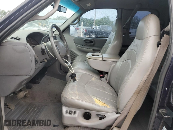 2000 Ford F-150 XL with VIN 1FTRX17L7YNC24292, listed as a Copart auction lot 58852925 with 213,318 mi miles and Salvage title. Bid and sale history available at DreamBid. Image 7.