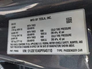 2023 Tesla Model 3 with VIN 5YJ3E1EA6PF645110, listed as a IAAI auction lot 42044357 with 24,352 mi miles and . Bid and sale history available at DreamBid. Image 9.