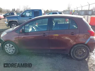 2009 Toyota Yaris with VIN JTDKT903X95258654, listed as a IAAI auction lot 41759756 with 93,810 mi miles. Bid and sale history available at carsss.com. Image 14.