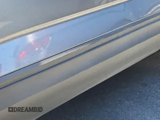 2023 Volkswagen Atlas SE z VIN 1V2HR2CA5PC526012, wystawiony jako IAAI lot #42796408 z przebiegiem 41 216 mil mil oraz . Historia ofert i sprzedaży dostępna na DreamBid. Obrazek 39.