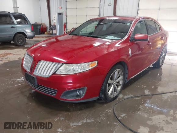 2009 Lincoln MKS with VIN 1LNHM94R59G610559, listed as a IAAI auction lot 41704552 with 168,556 mi miles. Bid and sale history available at carsss.com. Image 2.