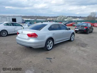 2012 Volkswagen Passat SE w/Sunroof with VIN 1VWBM7A32CC100678, listed as a IAAI auction lot 41925484 with 154,373 mi miles. Bid and sale history available at carsss.com. Image 4.