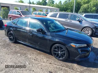 2023 Honda Civic Sport with VIN 2HGFE2F56PH509382, listed as a IAAI auction lot 42296205 with 125,584 mi miles and . Bid and sale history available at DreamBid. Image 1.