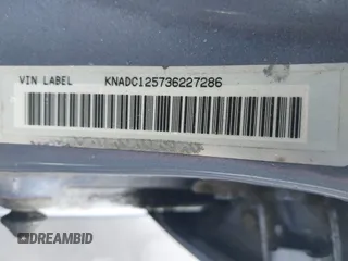 2003 Kia Rio with VIN KNADC125736227286, listed as a IAAI auction lot 41928174 with 151,431 mi miles. Bid and sale history available at carsss.com. Image 9.