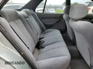 1995 Toyota Camry LE z VIN 4T1SK12E2SU617134, wystawiony jako Copart lot #54775365 z przebiegiem 305 046 mil mil oraz Szkoda całkowita • Salvage title. Historia ofert i sprzedaży dostępna na DreamBid. Obrazek 10.