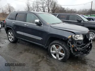 2013 Jeep Grand Cherokee Overland with VIN 1C4RJFCT6DC586933, listed as a Copart auction lot 78383184 with 80,249 mi miles and Salvage Title. Bid and sale history available at carsss.com. Image 4.