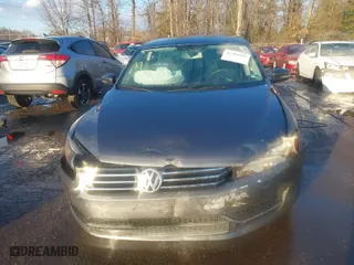 2015 Volkswagen Passat 1.8T S with VIN 1VWAT7A30FC018547, listed as a IAAI auction lot 41304925 with 76,384 mi miles. Bid and sale history available at carsss.com. Image 12.