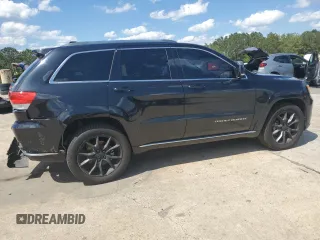 2015 Jeep Grand Cherokee Summit with VIN 1C4RJFJG6FC828922, listed as a Copart auction lot 54878415 with 125,781 mi miles and Salvage title. Bid and sale history available at DreamBid. Image 3.