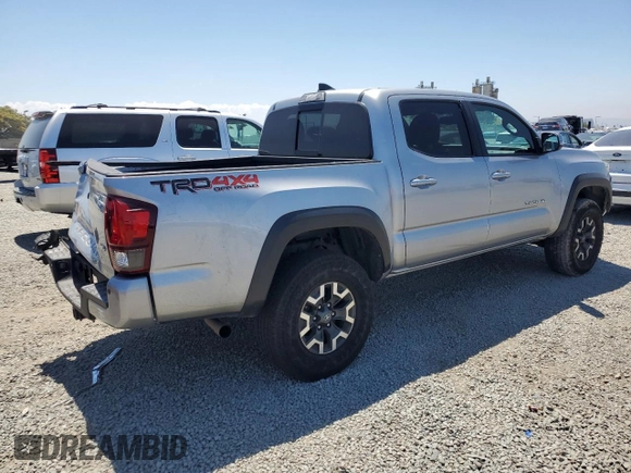 2018 Toyota Tacoma SR with VIN 3TMCZ5AN6JM129370, listed as a Copart auction lot 63042425 with 65,189 mi miles and Salvage title. Bid and sale history available at DreamBid. Image 3.