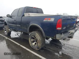 2003 Ford F-150 XL with VIN 1FTRX18L73NA26027, listed as a IAAI auction lot 41843867 with 1 mi miles. Bid and sale history available at carsss.com. Image 3.