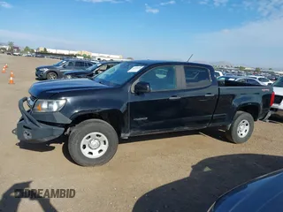 2020 Chevrolet Colorado 4WD Work Truck z VIN 1GCGTBENXL1212795, wystawiony jako IAAI lot #42249330 z przebiegiem 46 900 mil mil oraz . Historia ofert i sprzedaży dostępna na DreamBid. Obrazek 14.