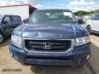 2011 Honda Ridgeline RT with VIN 5FPYK1F20BB001723, listed as a IAAI auction lot 40376797 with 167,706 mi miles. Bid and sale history available at carsss.com. Image 6.