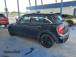 2018 MINI Hardtop 4 Door Cooper S with VIN WMWXU3C54J2F51176, listed as a Copart auction lot 64896135 with 16,418 mi miles and Salvage title. Bid and sale history available at DreamBid. Image 2.