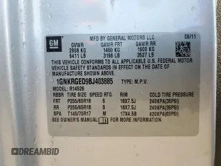 2011 Chevrolet Traverse 1LT z VIN 1GNKRGED9BJ403885, wystawiony jako Copart lot #56929765 z przebiegiem Nie podano mil oraz Szkoda całkowita • Salvage title. Historia ofert i sprzedaży dostępna na DreamBid. Obrazek 13.