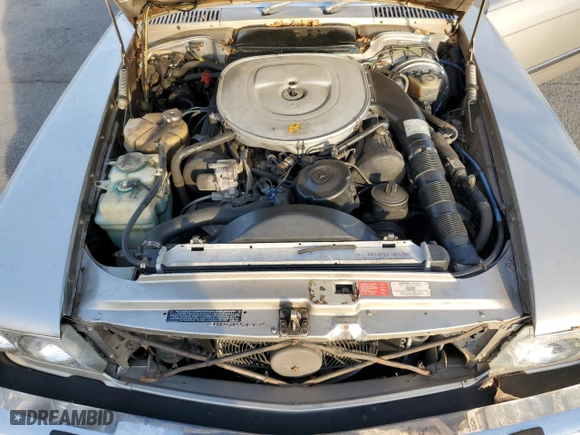 1987 Mercedes-Benz 560 Series 560SL with VIN WDBBA48D9HA070265, listed as a Copart auction lot 77411844 with 120,884 mi miles and Salvage Title. Bid and sale history available at carsss.com. Image 11.