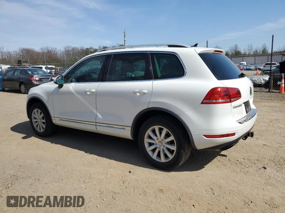 2012 Volkswagen Touareg Sport with VIN WVGEF9BP3CD011165, listed as a Copart auction lot 48913935 with 118,839 mi miles and Salvage Title. Bid and sale history available at DreamBid. Image 2.