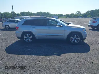 2011 Jeep Grand Cherokee Overland Summit with VIN 1J4RR6GT9BC535985, listed as a IAAI auction lot 42556913 with 108,845 mi miles and . Bid and sale history available at DreamBid. Image 13.