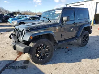 2017 Jeep Wrangler Sahara z VIN 1C4AJWBGXHL648213, wystawiony jako Copart lot #83816504 z przebiegiem 67 517 mil mil oraz Szkoda całkowita • Salvage title. Historia ofert i sprzedaży dostępna na DreamBid. Obrazek 1.