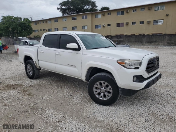 2018 Toyota Tacoma SR5 with VIN 3TMAZ5CN4JM063809, listed as a Copart auction lot 46245495 with NaN miles and Salvage Title. Bid and sale history available at carsss.com. Image 4.