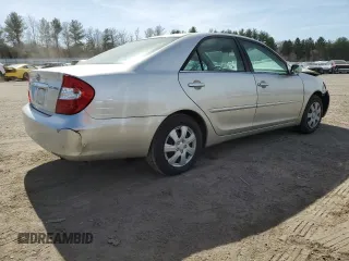 2002 Toyota Camry LE z VIN 4T1BE32K02U084676, wystawiony jako Copart lot #49712395 z przebiegiem 74 049 mil mil oraz Czysty tytuł • Clean title. Historia ofert i sprzedaży dostępna na DreamBid. Obrazek 3.
