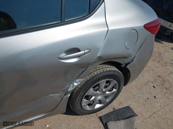 2014 Mazda Mazda3 i SV with VIN JM1BM1T77E1184656, listed as a IAAI auction lot 41703402 with 57,025 mi miles. Bid and sale history available at carsss.com. Image 6.